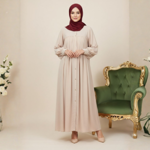 The Button-Front Pleated Yoke Abaya in Soft Beige